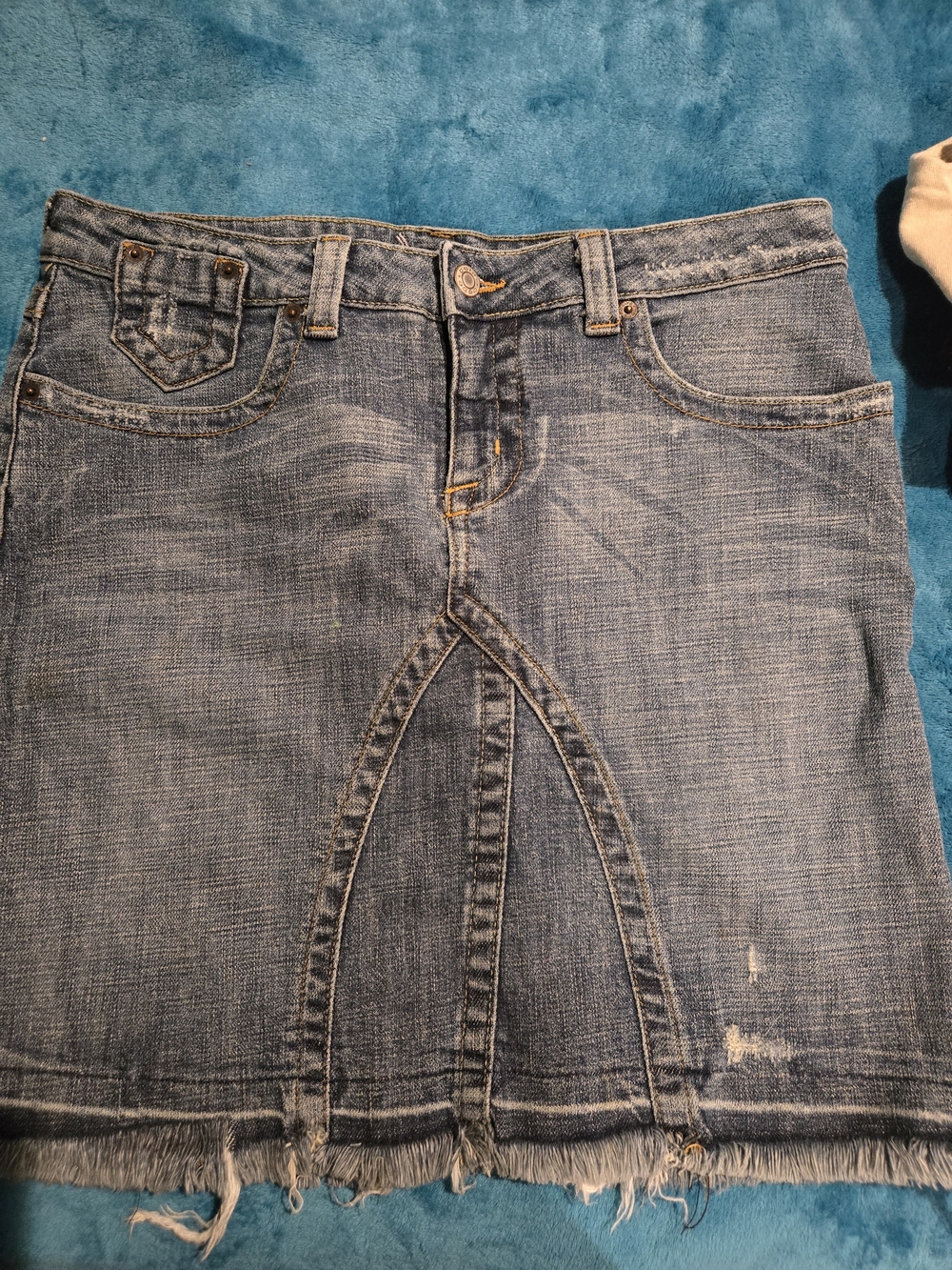 BEBE brand Light Blue Denim Mini Skirt with Frayed Hem Size 31 = Size 12 Large